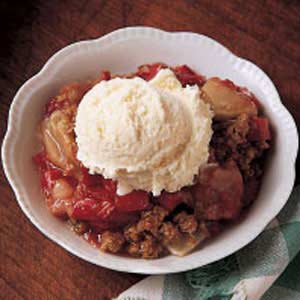 Gluten Free Berry & Rhubarb Crisp served with Vanilla Ice Cream